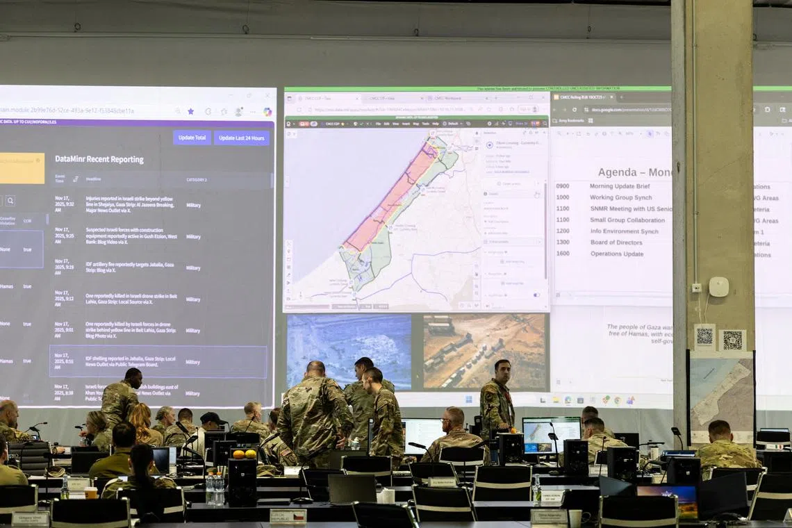 FILE PHOTO: U.S. and Israeli soldiers convene at the Civil Military Coordination Centre, the U.S.-led centre overseeing the implementation of President Donald Trump's plan to end the war in Gaza, in Kiryat Gat, southern Israel November 17, 2025. REUTERS/Alexander Cornwell/File Photo