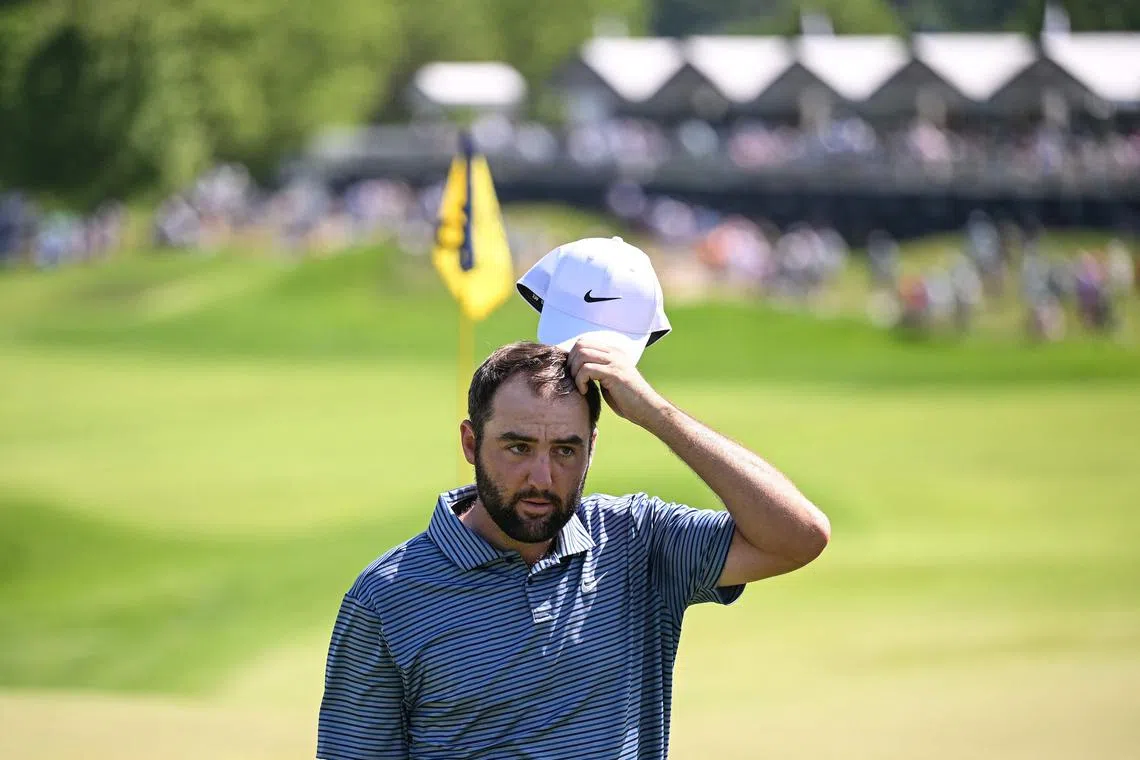 Scottie Scheffler walks off the 18th green during the final round of the 2024 PGA Championship at Valhalla Golf Club on May 19, 2024.