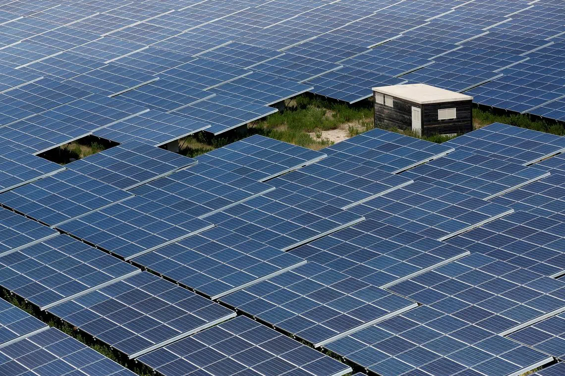 FILE PHOTO: Solar panels to produce renewable energy are seen at the Urbasolar photovoltaic park in Gardanne, France, June 25, 2018.    REUTERS/Jean-Paul Pelissier/File Photo