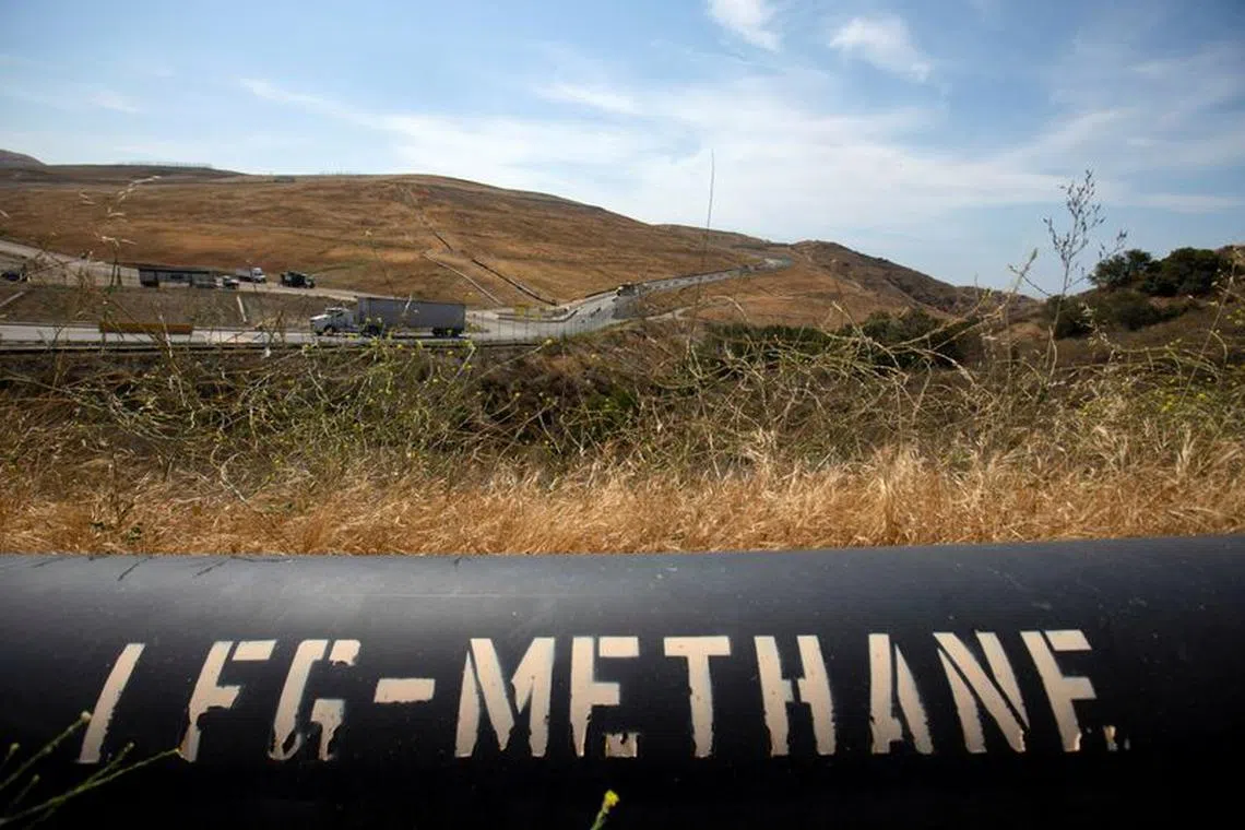 A pipeline that moves methane gas from the Frank R. Bowerman landfill to an onsite power plant is shown in Irvine, California, California, U.S., June 15, 2021. REUTERS/Mike Blake/File Photo
