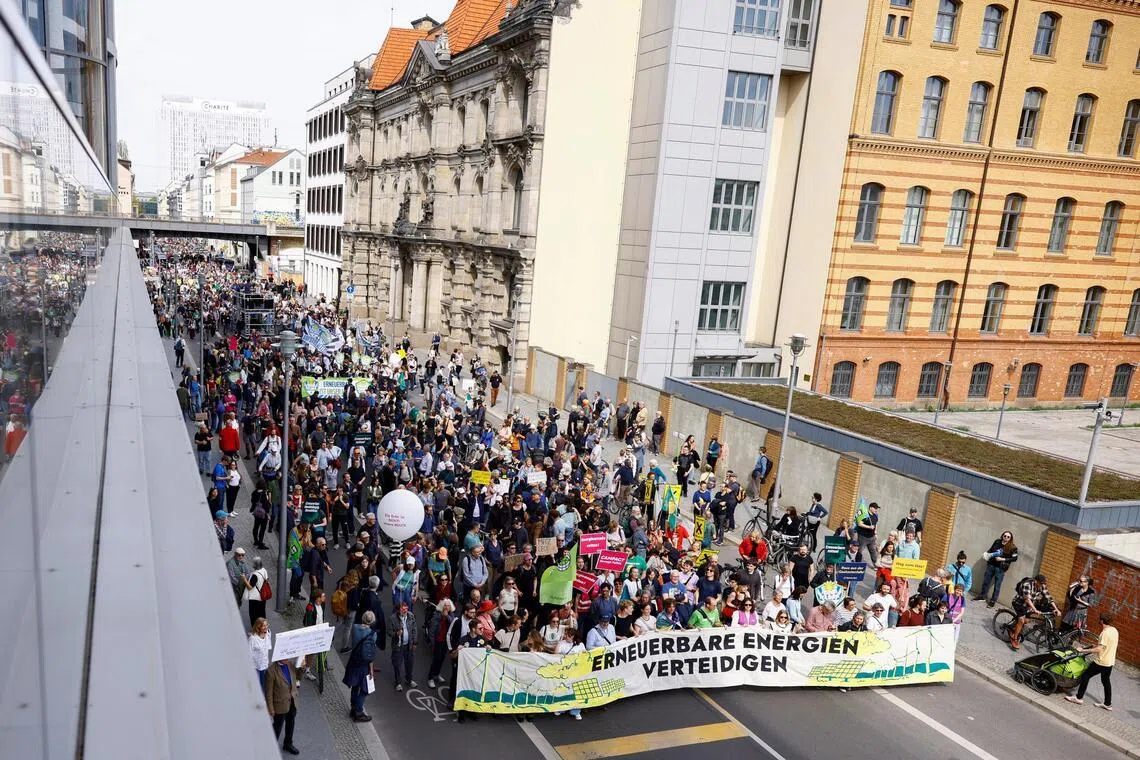 Crowds took to the streets in Germany's Berlin (above), Cologne, Hamburg and Munich on April 18, demanding a faster shift to renewable energy.