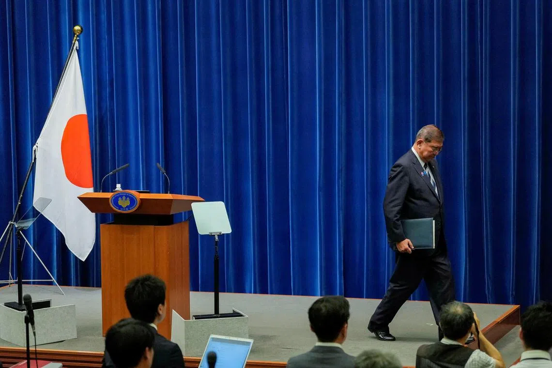 Japanese Prime Minister Shigeru Ishiba walks on the day of a press conference as he announces his resignation, in Tokyo, on Sept 7.