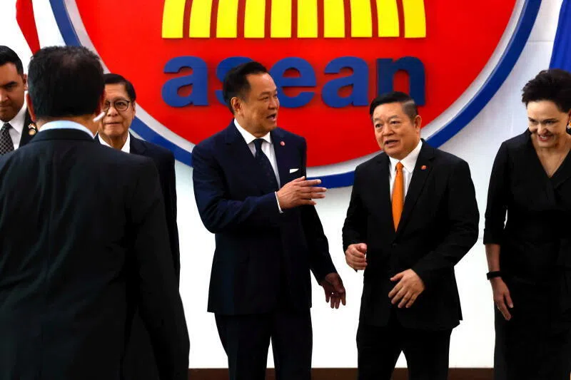 Thailand’s Prime Minister Anutin Charnvirakul (centre left) talks to ASEAN Secretary-General Kao Kim Hourn during a meeting at the ASEAN Secretariat in Jakarta.