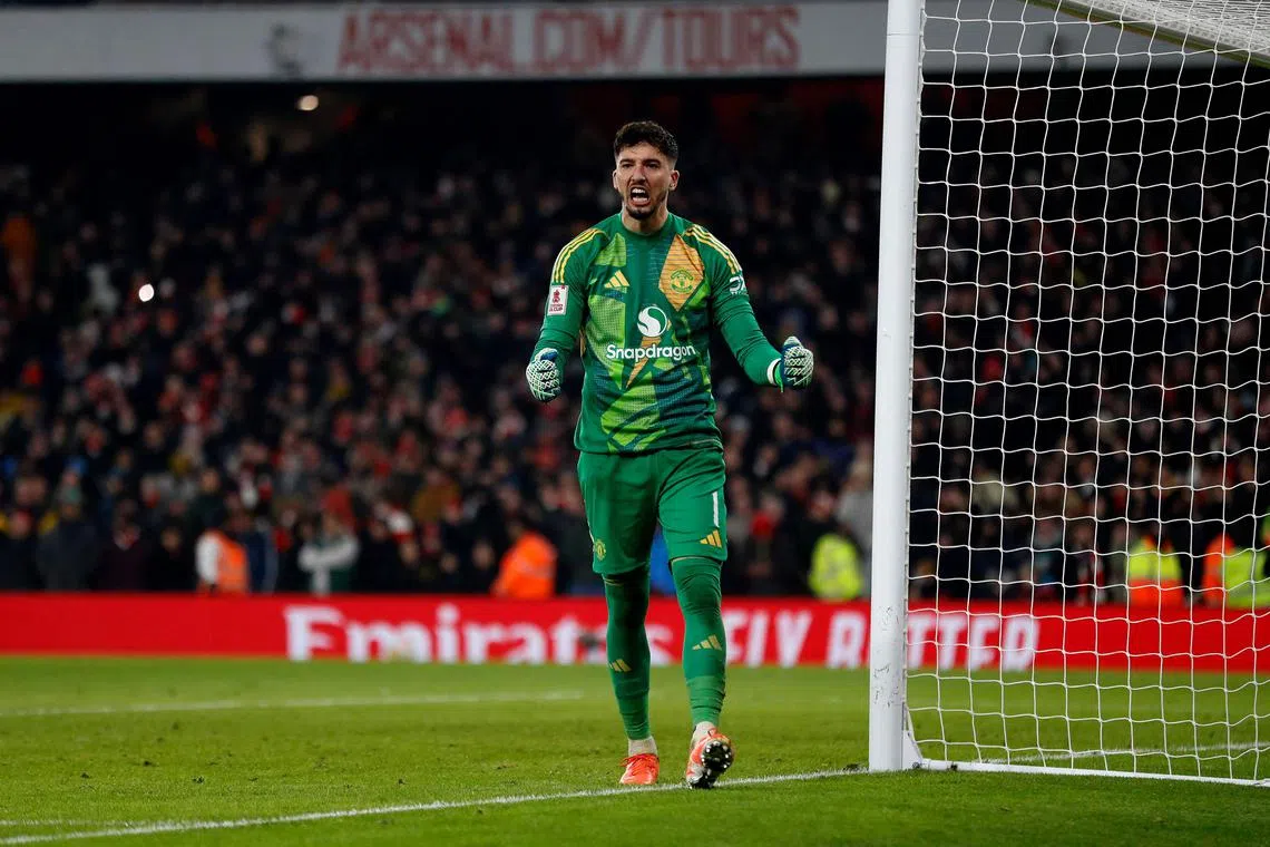 Manchester United's Turkish goalkeeper #01 Altay Bayindir reacts after saving the penalty of Arsenal's German midfielder #29 Kai Havertz during a penalty shoot out during the English FA Cup third round football match between Arsenal and Manchester United at the Emirates Stadium in London on January 12, 2025. Manchester United won the match following a penalty shoot out. (Photo by Ian Kington / IKIMAGES / AFP) / RESTRICTED TO EDITORIAL USE. No use with unauthorized audio, video, data, fixture lists, club/league logos or 'live' services. Online in-match use limited to 45 images, no video emulation. No use in betting, games or single club/league/player publications.