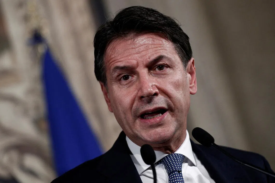 FILE PHOTO: Leader of 5-Star Movement Giuseppe Conte speaks to the media following a meeting with Italian President Sergio Mattarella at the Quirinale Palace in Rome, Italy October 20, 2022. REUTERS/Guglielmo Mangiapane/File Photo