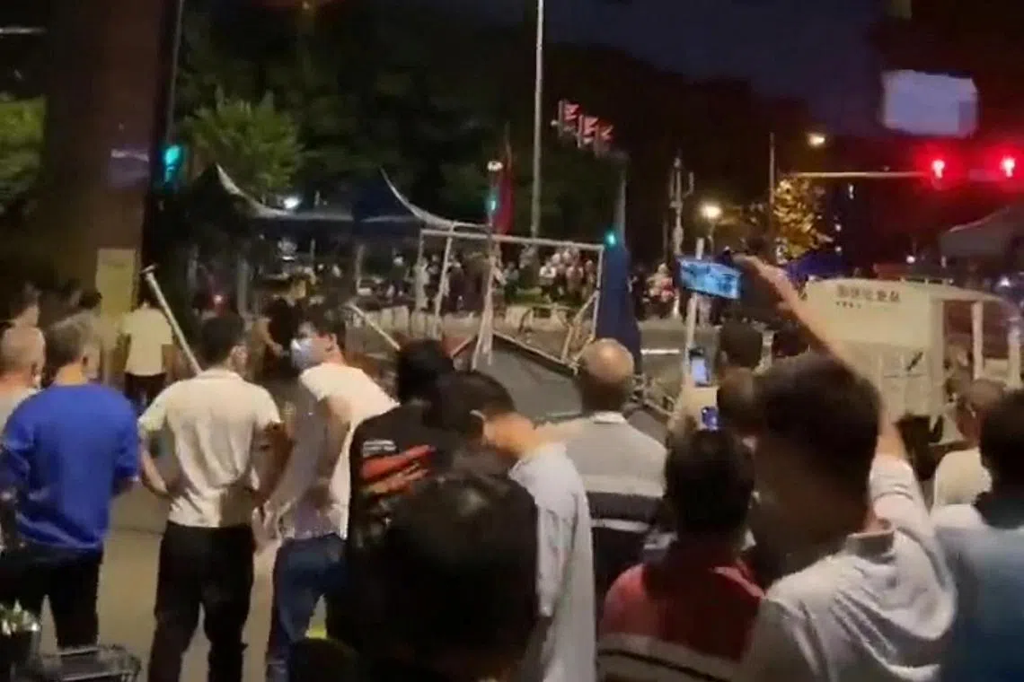 Protesters in Guangzhou on Nov 29.. At least six demonstrators in Shanghai and Guangzhou have been held for a week or longer.