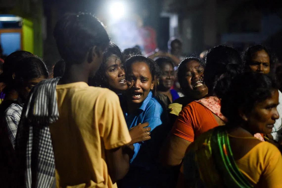 Family members mourn the death of people who died after consuming toxic liquor at Kallakurichi, in Tamil Nadu, India, June 20, 2024. REUTERS/Stringer/File Photo