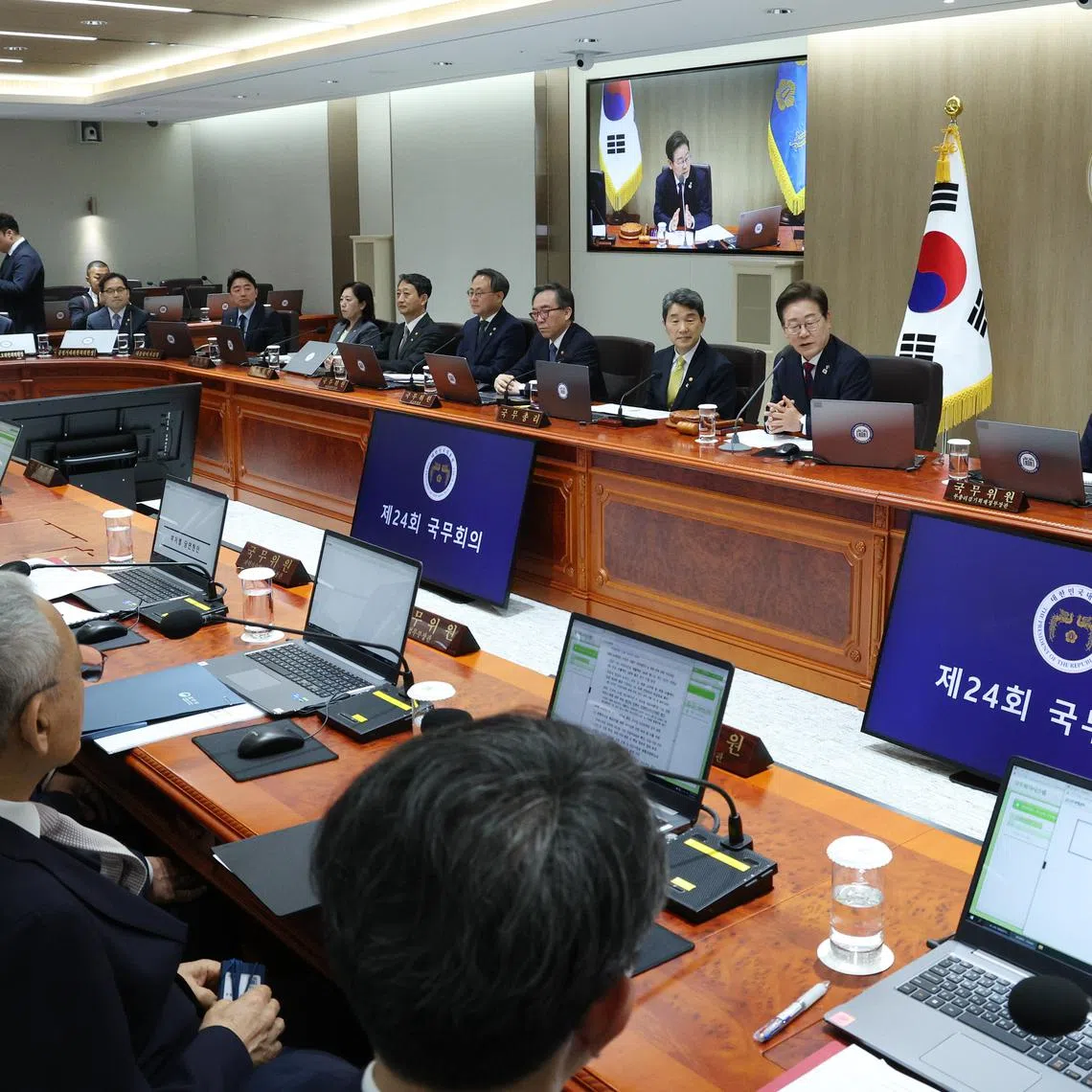 epa12156428 Newly elected South Korean President Lee Jae-myung (Back 3-R) speaks during a Cabinet meeting at the presidential office in Seoul, South Korea, on 05 June 2025, one day after he was sworn in as the president.  EPA-EFE/YONHAP / POOL SOUTH KOREA OUT