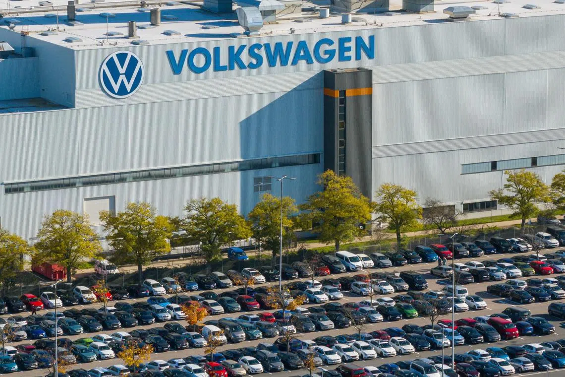 Aerial view taken on October 28, 2024 shows the plant of German car maker Volkswagen (VW) in Zwickau, eastern Germany. Ailing auto giant Volkswagen plans to close at least three factories in Germany and slash tens of thousands of jobs as part of drastic cost-savings drive, workers' representatives said on October 28, 2024, calling the proposed cuts "of historic dimensions". The plan laid out by management, which affects the namesake VW brand, also includes a 10-percent pay cut for all staff, the company's powerful works council said in an update to staff. (Photo by AFP)