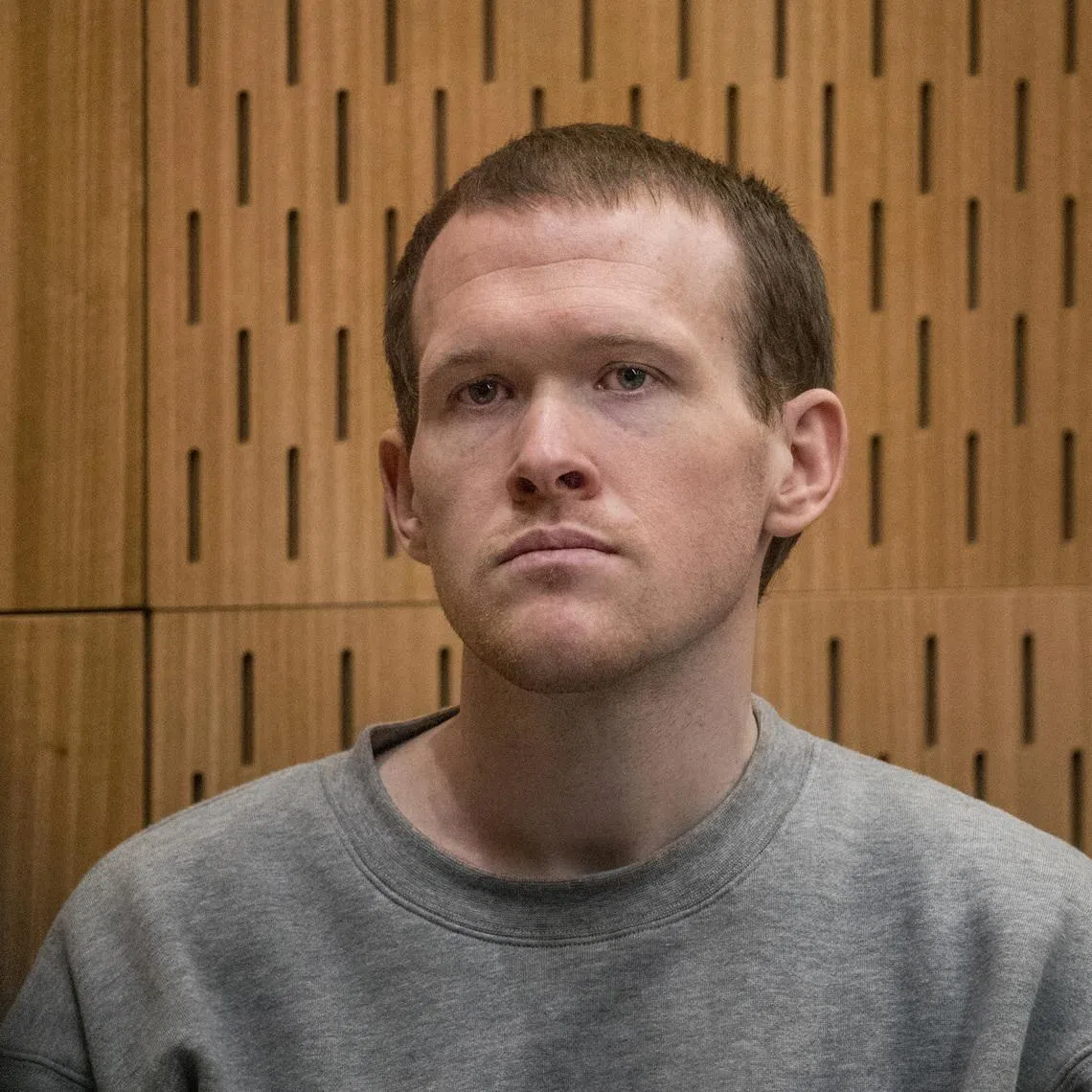 Brenton Tarrant, the gunman who shot and killed worshippers in the Christchurch mosque attacks, listens as Crown prosecutor Mark Zarifeh delivers his submission during Tarrant's sentencing at the High Court in Christchurch, New Zealand, August 27, 2020.  John Kirk-Anderson/Pool via REUTERS/File Photo