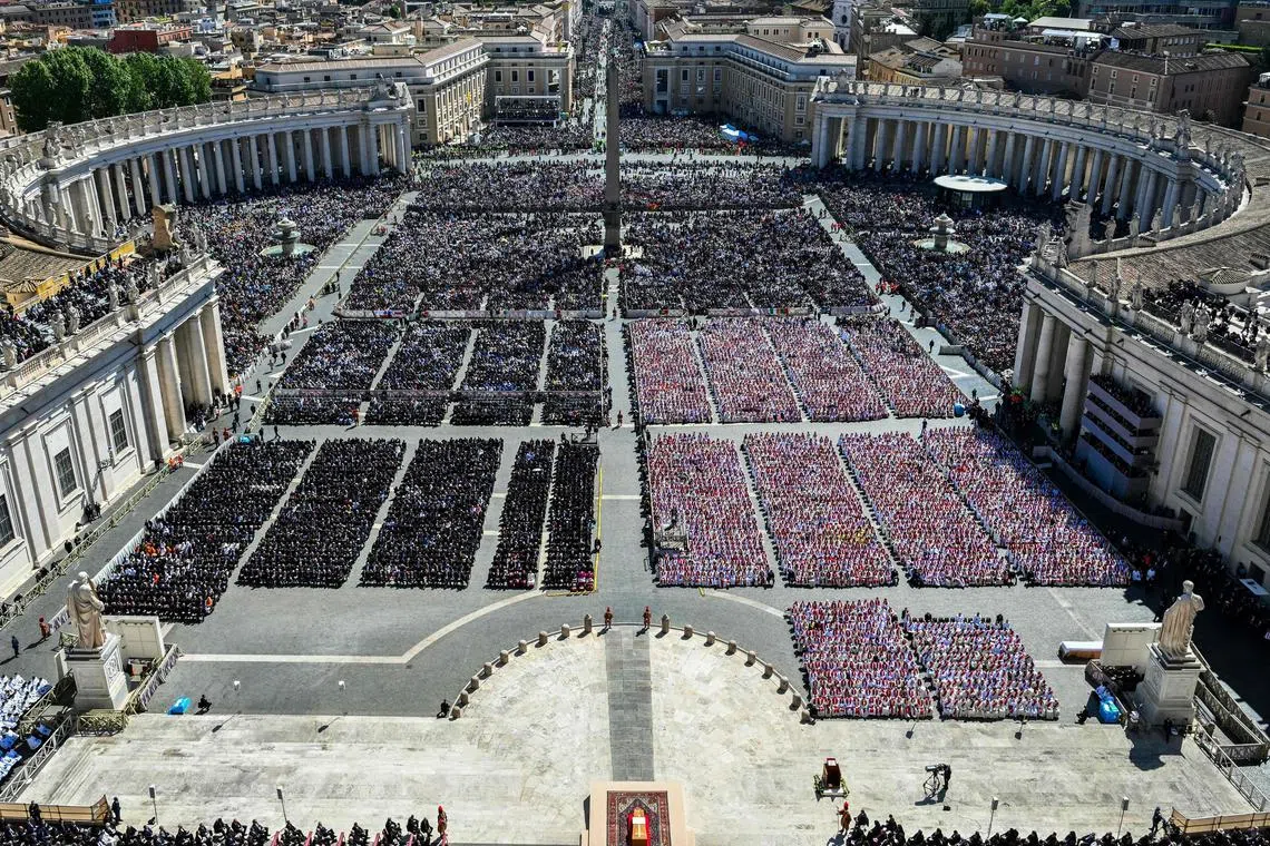 A photograph taken from St Peter Basilica showing a general view of late Pope Francis' coffin during the funeral ceremony in St Peter's Square at the Vatican, on April 26, 2025. 