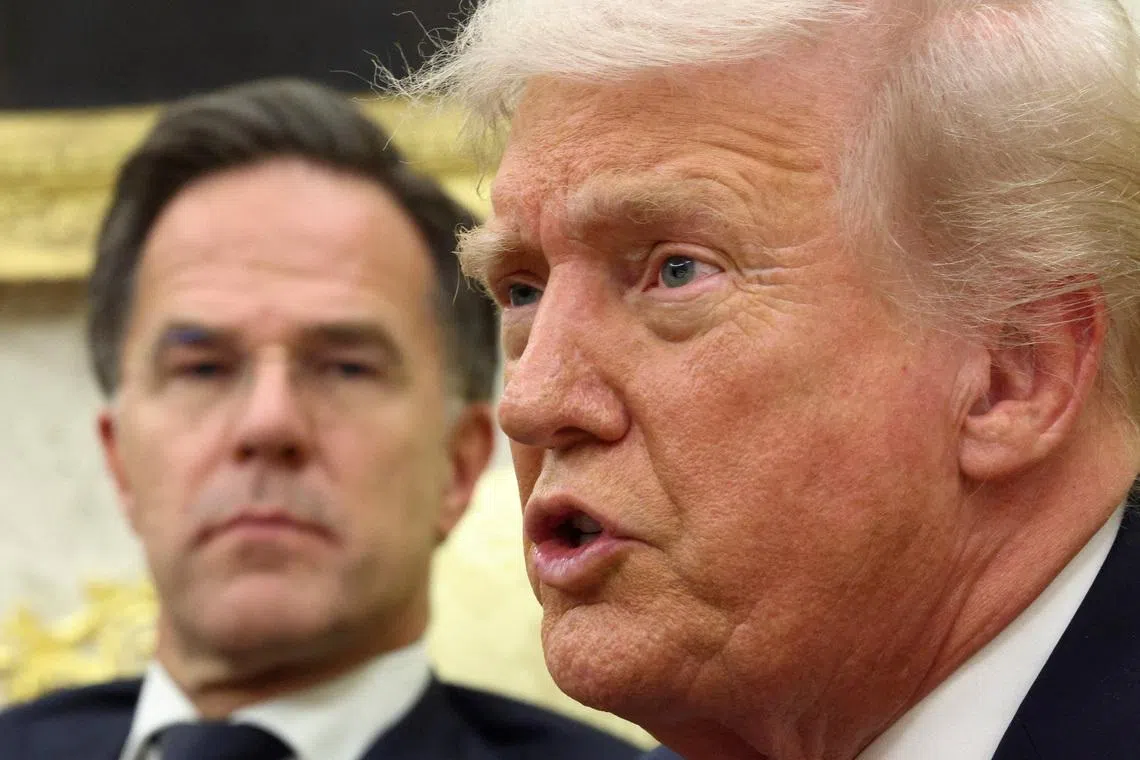 U.S. President Donald Trump speaks as he meets with Secretary General of the North Atlantic Treaty Organization (NATO) Mark Rutte in the Oval Office of the White House in Washington, D.C., U.S., October 22, 2025.  REUTERS/Kevin Lamarque