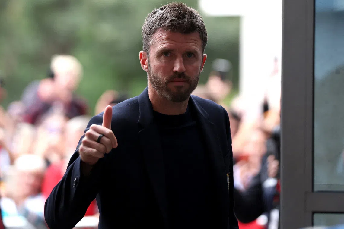 Manchester United manager Michael Carrick arrives at the MKM stadium before the match against Hull City on Aug 22.