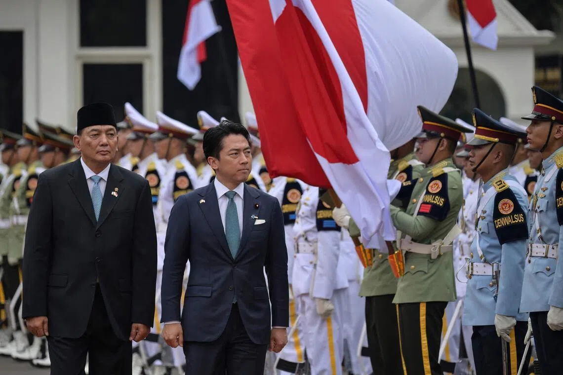 Indonesia’s Defence Minister Sjafrie Sjamsoeddin (left) and Japan’s Defence Minister Shinjiro Koizumi (right) inspect honour guards during a welcome ceremony at the Defence Ministry office in Jakarta on May 4, 2026.