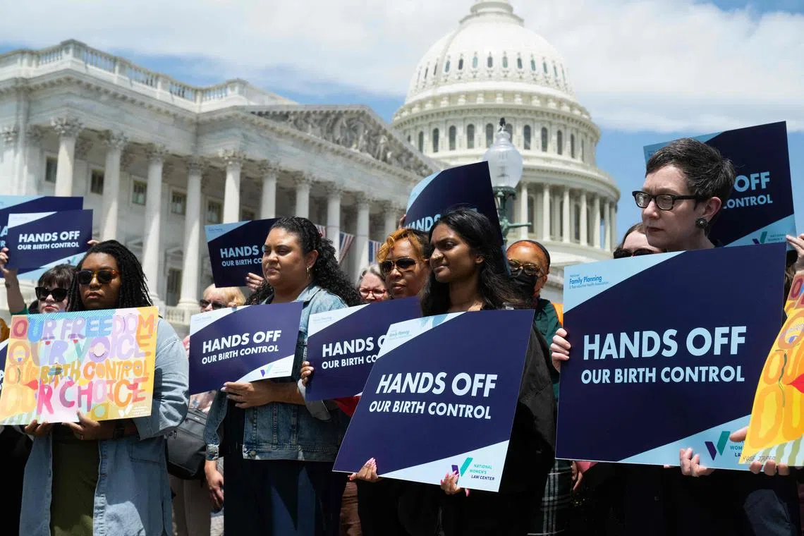 Supporters of the Right to Contraception Act protest during a news conference outside the US Capitol in Washington DC, on June 14.