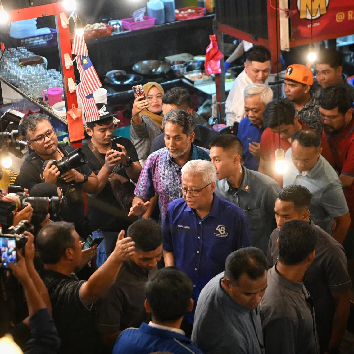 Malaysia's caretaker Prime Minister Ismail Sabri Yaakob campaigning at Real Tomyam in Uptown Damansara, on Nov 14, 2022.  