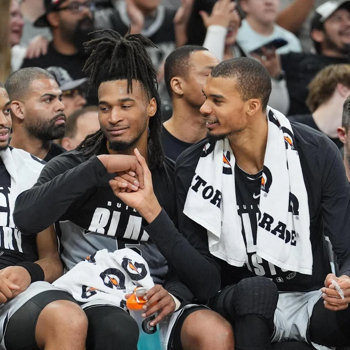 San Antonio Spurs forward Victor Wembanyama (right) shaking the hand of guard Stephon Castle during the second half of the 138-125 win over the reeling Dallas Mavericks  at Frost Bank Center on Feb 7, 2026.