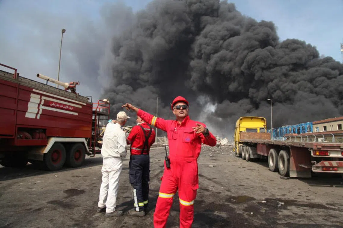 Smoke from the explosion is seen at the Shahid Rajaee port in Bandar Abbas, Iran, April 26, 2025. Mohammad Rasoul Moradi/IRNA/WANA (West Asia News Agency) via REUTERS ATTENTION EDITORS - THIS PICTURE WAS PROVIDED BY A THIRD PARTY