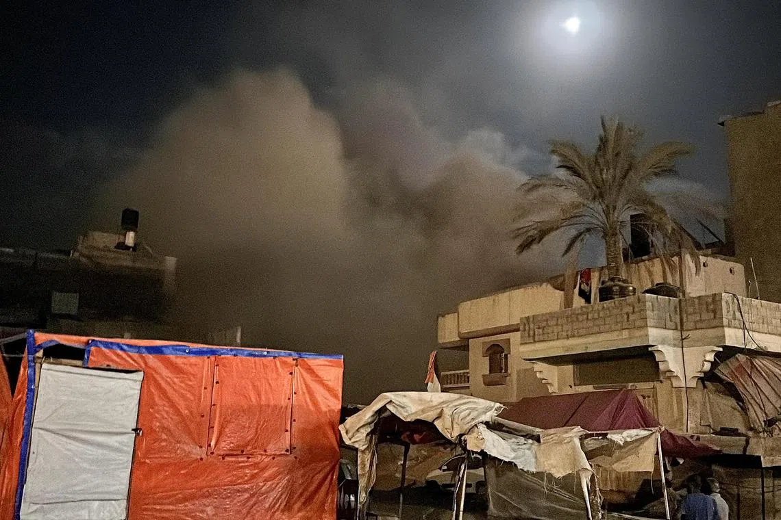 Smoke rises after an Israeli air strike on a house, amid the Israel-Hamas conflict, in Khan Younis, in the southern Gaza Strip, June 20, 2024. REUTERS/Doaa Mohammed
