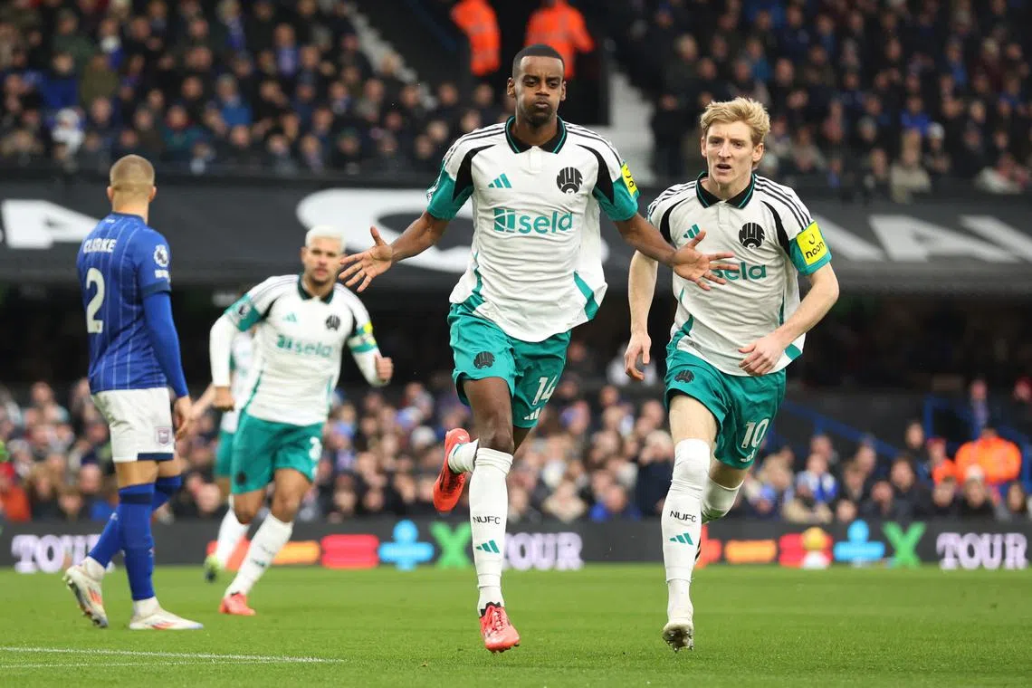 Newcastle United's Alexander Isak celebrates scoring their first goal before it is disallowed.