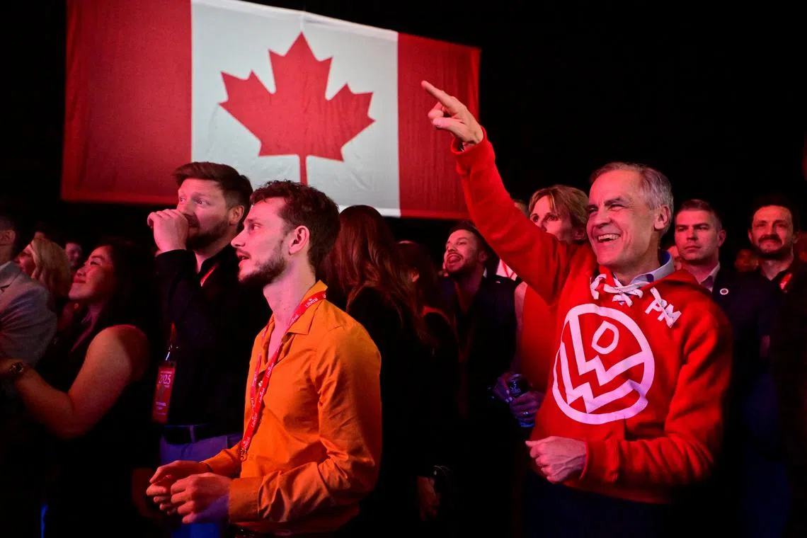 Canada's Prime Minister Mark Carney dances during an event at the Liberal Party election night headquarters in Ottawa, Ontario, Canada April 29, 2025. REUTERS/Jennifer Gauthier