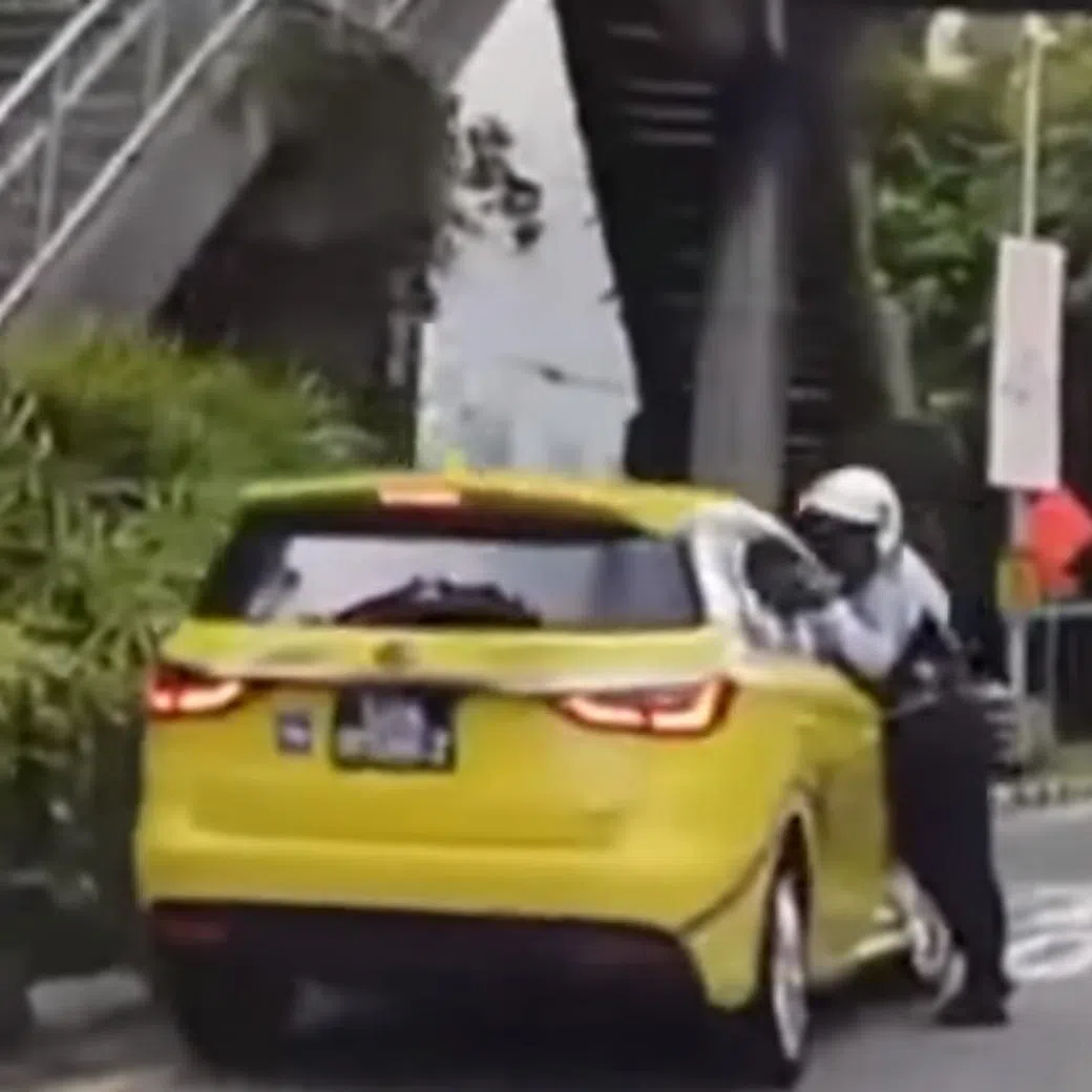 Jeremiah Ong Seng Hwee was also disqualified from driving for eight months after pleading guilty to causing grievous hurt to the Traffic Police officer.