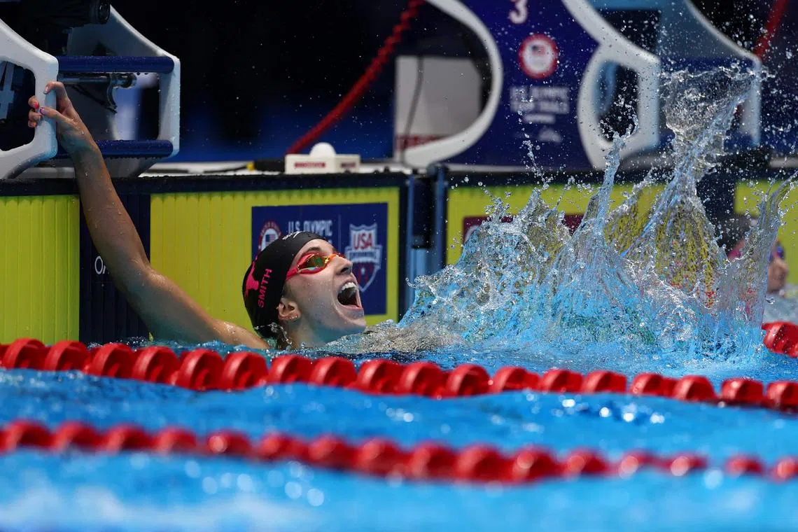 Regan Smith of the United States reacts after setting the word record in the women's 100m backstroke final at the US Olympic trials.