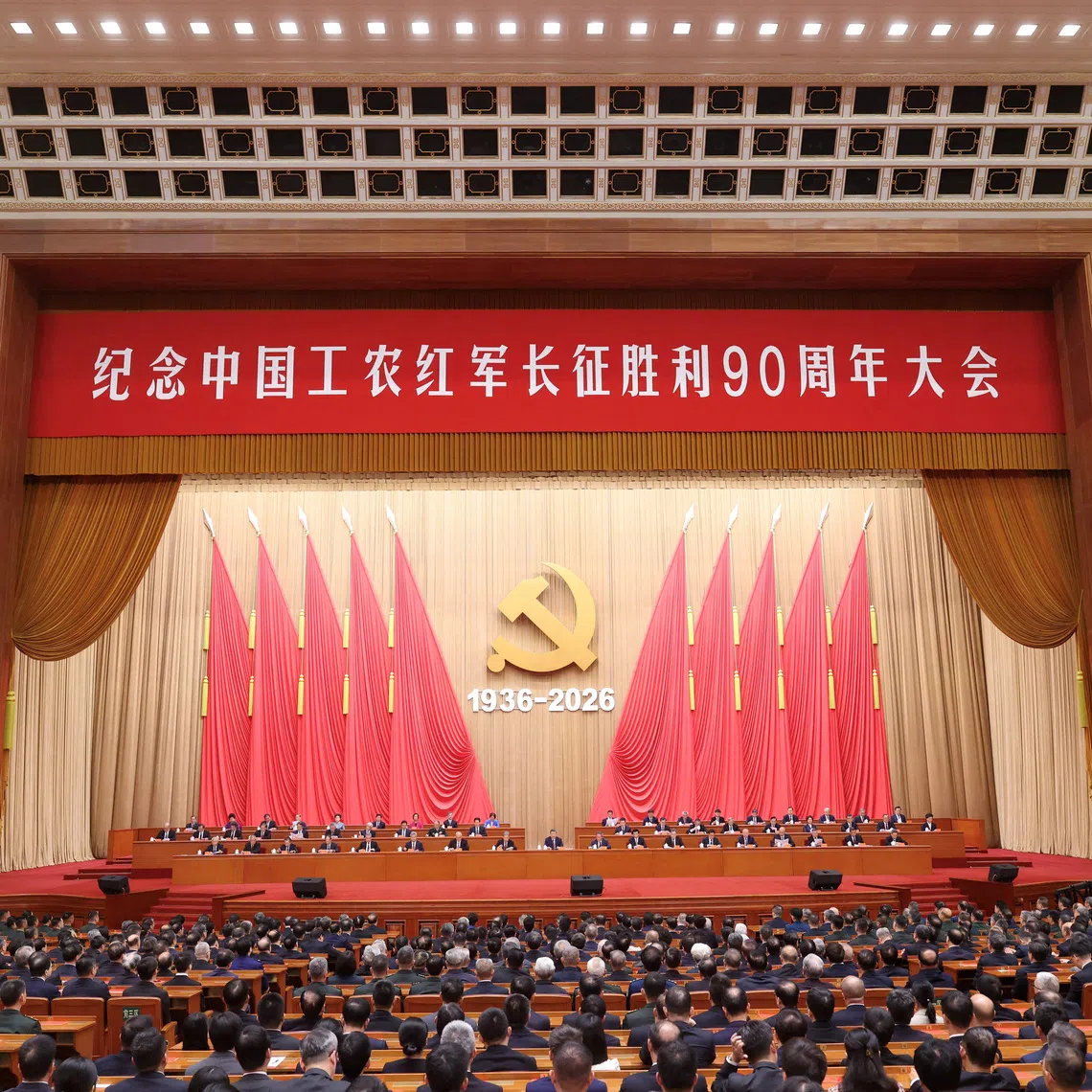 Chinese President Xi Jinping and other officials attend a gathering commemorating the 90th anniversary of the end of the Long March, at the Great Hall of the People in Beijing, China, October 22, 2026. cnsphoto via REUTERS
