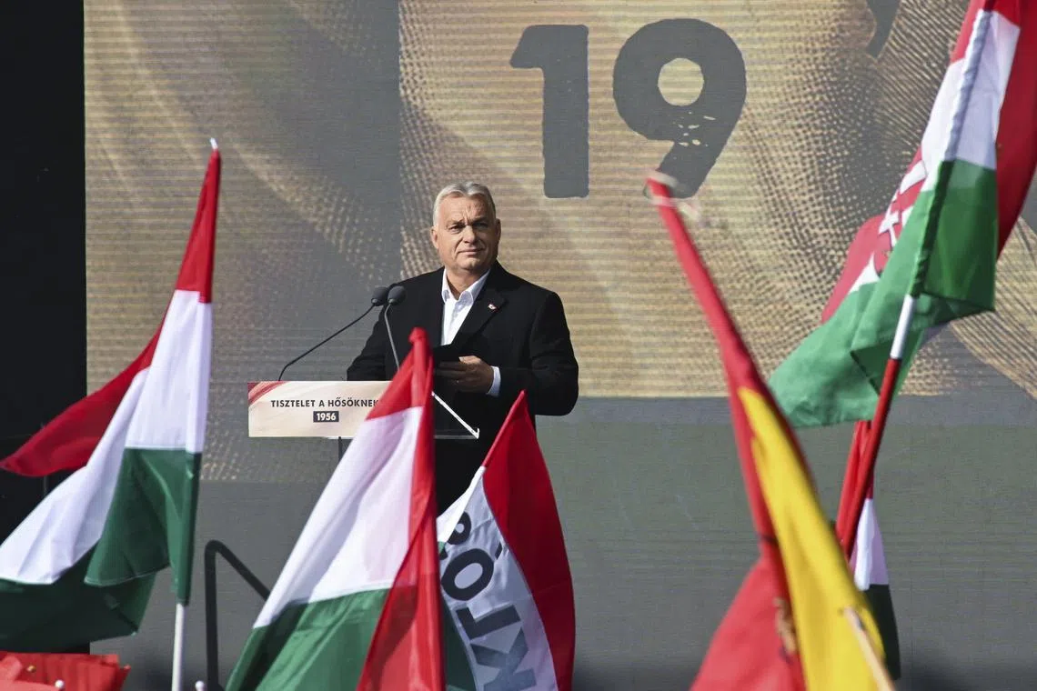 Hungarian Prime Minister Viktor Orban delivers a speech during the commemoration of the 68th anniversary of the outbreak of the Hungarian revolution in Budapest on Oct 23.