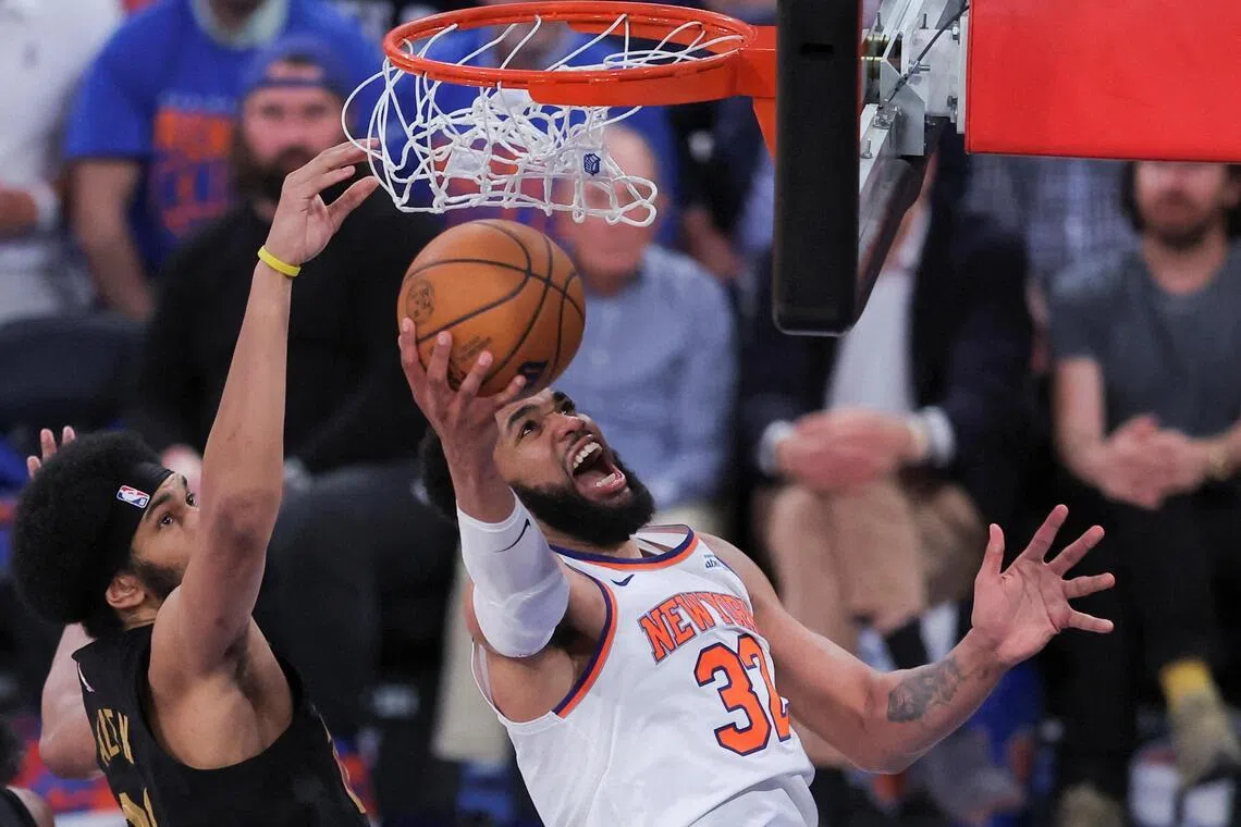New York Knicks centre Karl-Anthony Towns shoots against Cleveland Cavaliers center Jarrett Allen during the fourth quarter of Game 1 on May 19.