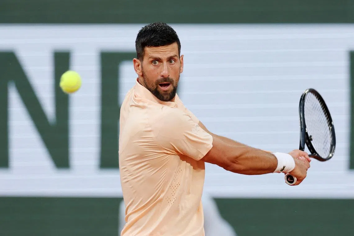 Tennis - French Open - Roland Garros, Paris, France - May 24, 2026  Serbia's Novak Djokovic in action during his first round match against France's Giovanni Mpetshi Perricard. REUTERS/Stephane Mahe