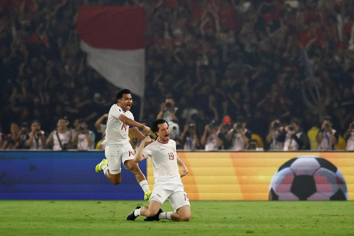 FILE PHOTO: Soccer Football - World Cup - AFC Asian Qualifiers - Group F - Indonesia v Philippines - Gelora Bung Karno Stadium, Jakarta, Indonesia - June 11, 2024 Indonesia's Thom Haye celebrates scoring their first goal with Asnawi Mangkualam REUTERS/Willy Kurniawan/File Photo