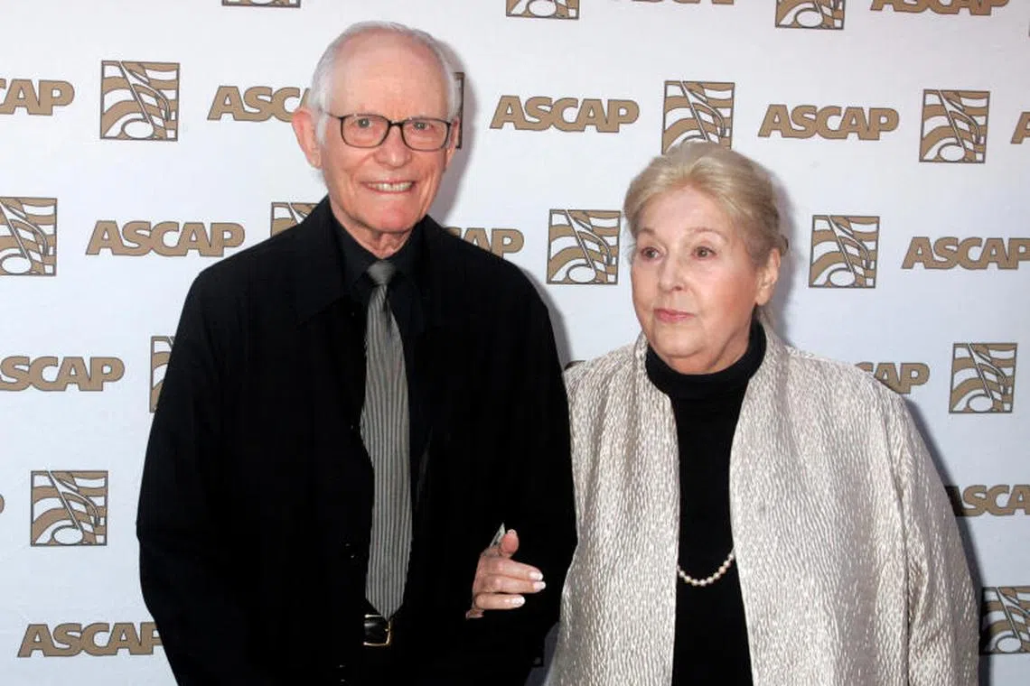 FILE PHOTO: Oscar winning songwriters Alan and Marilyn Bergman arrive at the 26th annual ASCAP Pop Music Awards in Hollywood, California April 22, 2009. REUTERS/Fred Prouser/File Photo