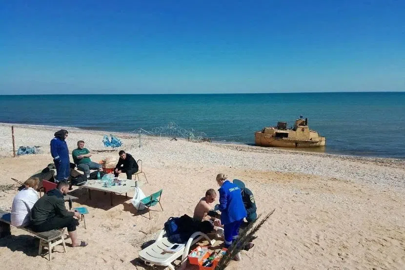 Russian grain ship believed sunk in Ukrainian drone attack is found and towed to shore, TASS says