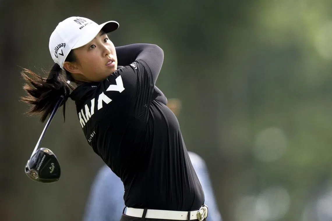 Sep 10, 2023; Cincinnati, Ohio, USA; Rouning Yin, of China, tees off on hole 16 during the final round of the 2023 Kroger Queen City Championship in at Kenwood Country Club. Mandatory Credit: Albert Cesare-USA TODAY Sports