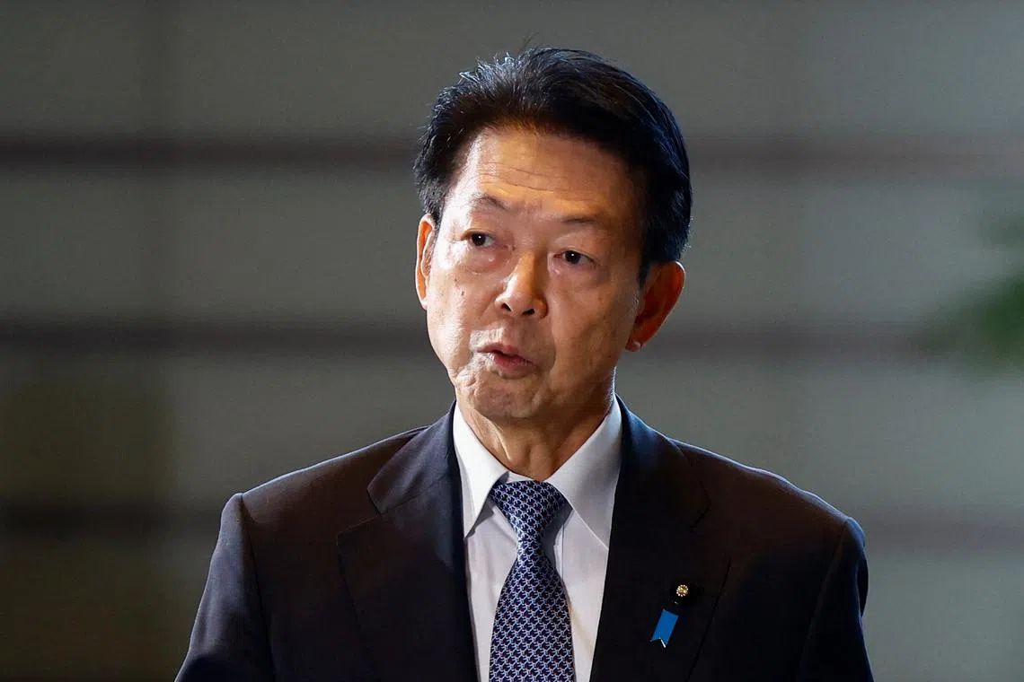 FILE PHOTO: Japan's Minister of Economy, Trade and Industry (METI) Yoji Muto arrives at Prime Minister Shigeru Ishiba's official residence in Tokyo, Japan October 1, 2024. REUTERS/Issei Kato/File Photo