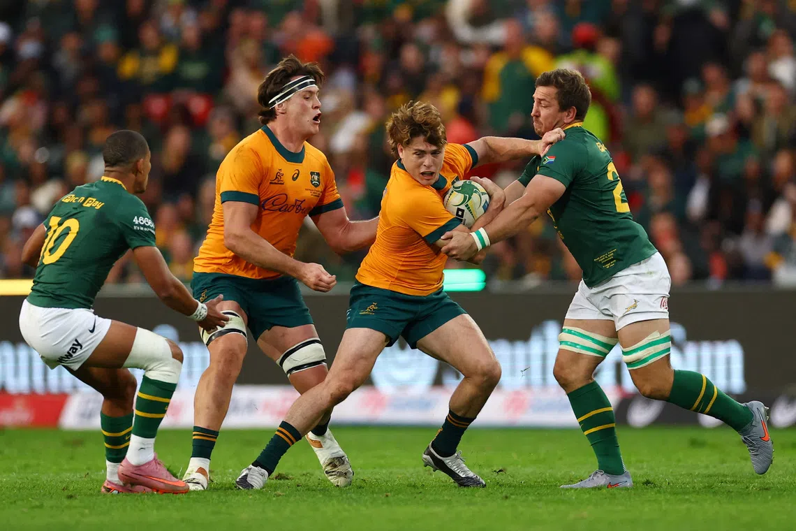 FILE PHOTO: Rugby Union - Rugby Championship - South Africa v Australia - Ellis Park, Johannesburg, South Africa - August 16, 2025 Australia's James O'Connor in action with South Africa's Kwagga Smith REUTERS/Siphiwe Sibeko/File Photo