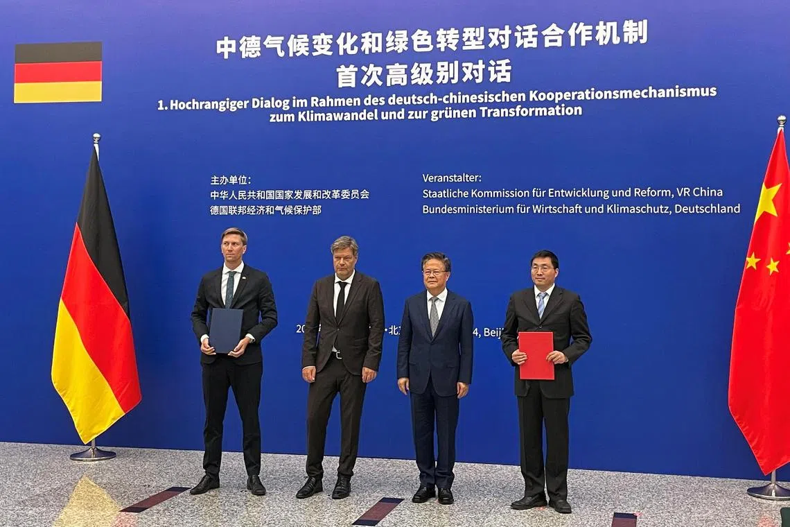 German Vice Chancellor and Economy Minister Robert Habeck (second from left) with National Development and Reform Commission Chairman Zheng Shanjie (second from right)following the opening session of the German-Chinese Climate and Transformation Dialogue in Beijing on June 22.