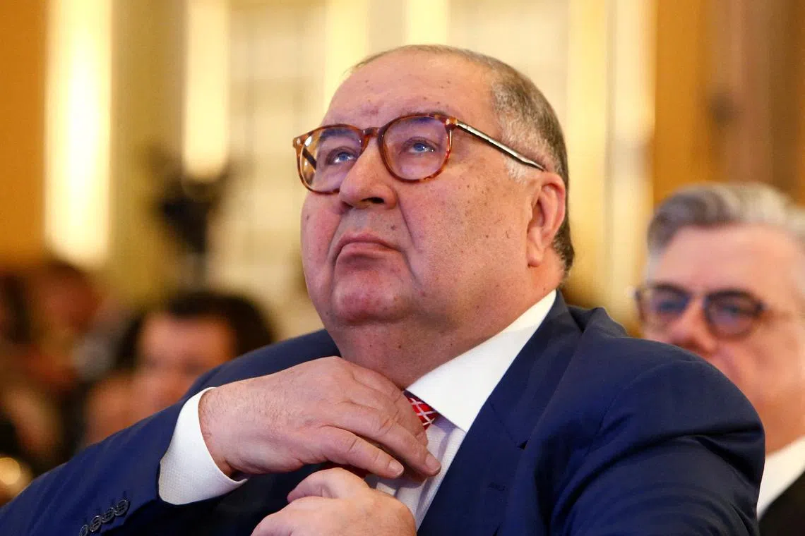 FILE PHOTO: Businessman Alisher Usmanov attends a session during the Week of Russian Business, organised by the Russian Union of Industrialists and Entrepreneurs (RSPP), in Moscow, Russia March 16, 2017. REUTERS/Sergei Karpukhin/File Photo
