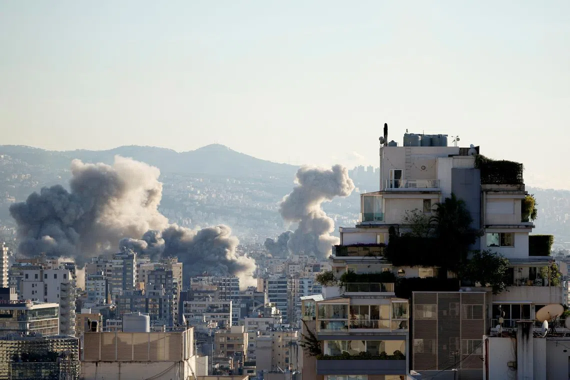 Smoke billows over Beirut's southern suburbs, after Israeli strikes, amid the ongoing hostilities between Hezbollah and Israeli forces, as seen from Ashrafieh, Lebanon, November 26, 2024. REUTERS/Adnan Abidi