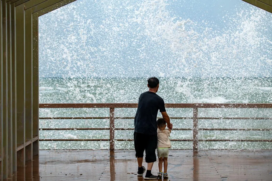 Waves crashing against the shore as tropical storm Maysak approaches in Boao, Qionghai, Hainan province, on July 3.