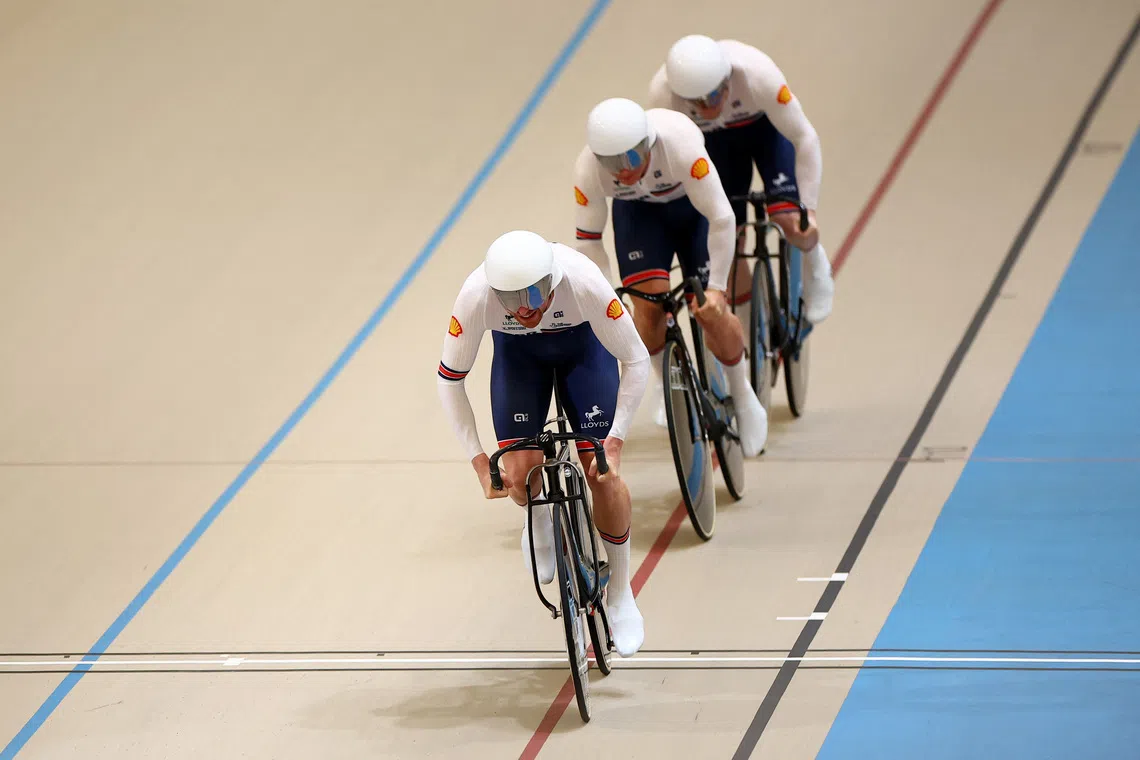 Cycling - UCI Track World Championships - Penalolen Velodrome, Santiago, Chile - October 22, 2025 Britain's Harry Ledingham-Horn, Matthew Richardson and Joseph Truman in action during the men's team sprint qualification REUTERS/Agustin Marcarian