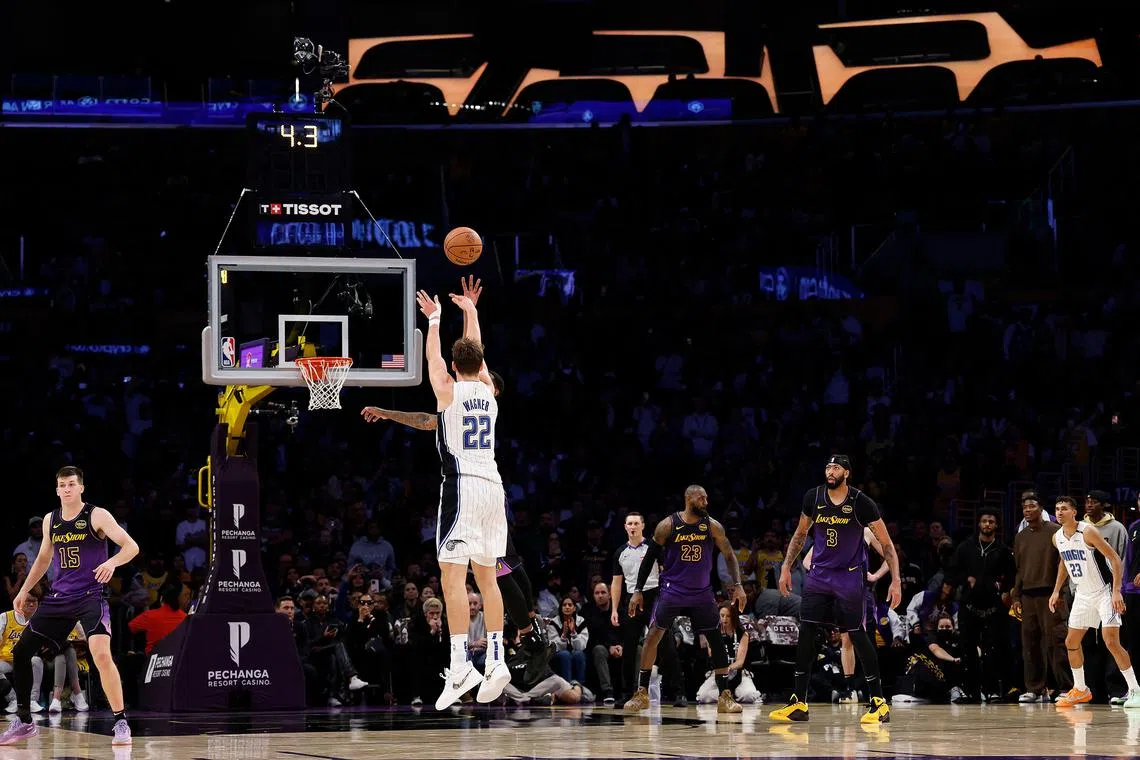 Franz Wagner of the Orlando Magic makes a game-winning three-point shot against the Los Angeles Lakers at Crypto.com Arena.