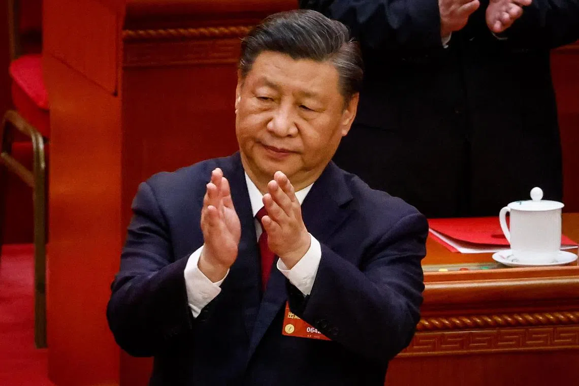 epa10519046 Chinese President Xi Jinping applauds during the Closing Session of the National People's Congress (NPC) at the Great Hall of the People, in Beijing, China, 13 March 2023. China holds two major annual political meetings, the National People's Congress (NPC) and the Chinese People's Political Consultative Conference (CPPCC) which run alongside and together are known as 'Lianghui' or 'Two Sessions'.  EPA-EFE/MARK R. CRISTINO