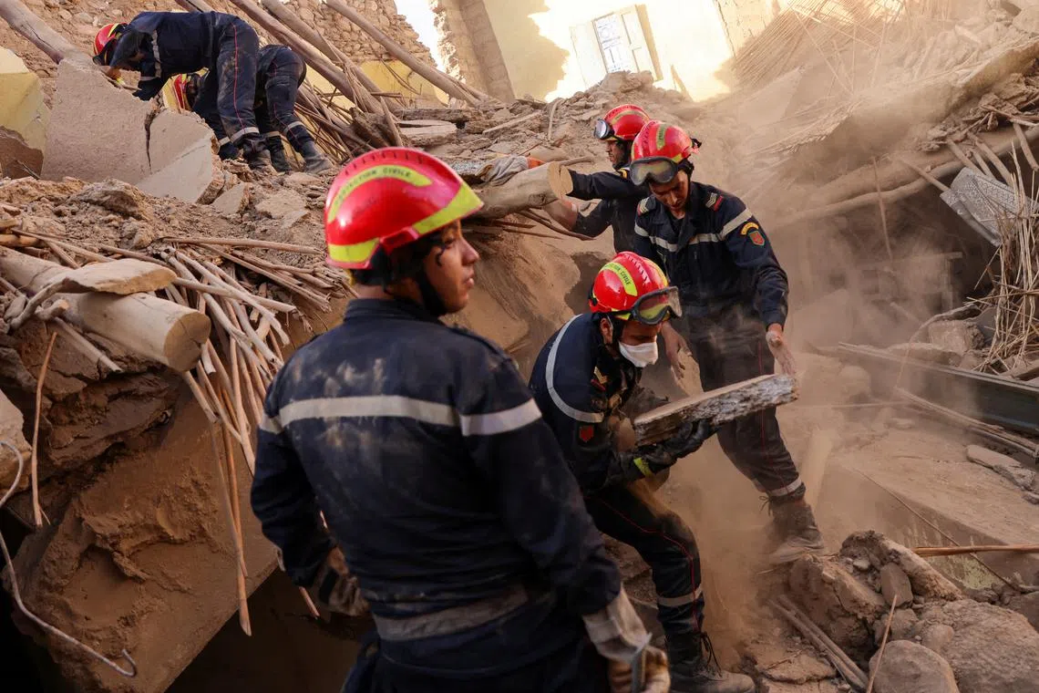 Emergency crews working in the aftermath of a deadly earthquake, in Amizmiz, Morocco, on Sept 10, 2023. 