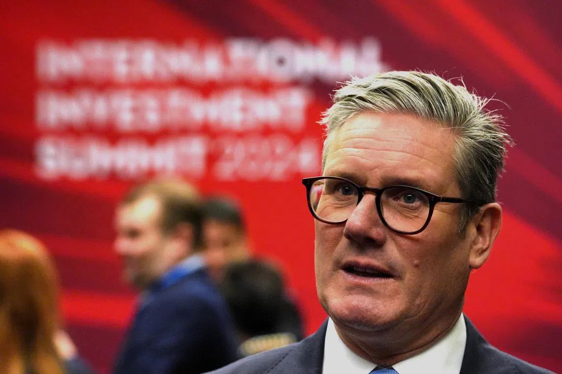 Prime Minister Keir Starmer speaks with leaders from across the UK during the International Investment Summit in London, which brings together up to 300 industry leaders to boost investment in the UK, October 14, 2024.  Jonathan Brady/Pool via REUTERS