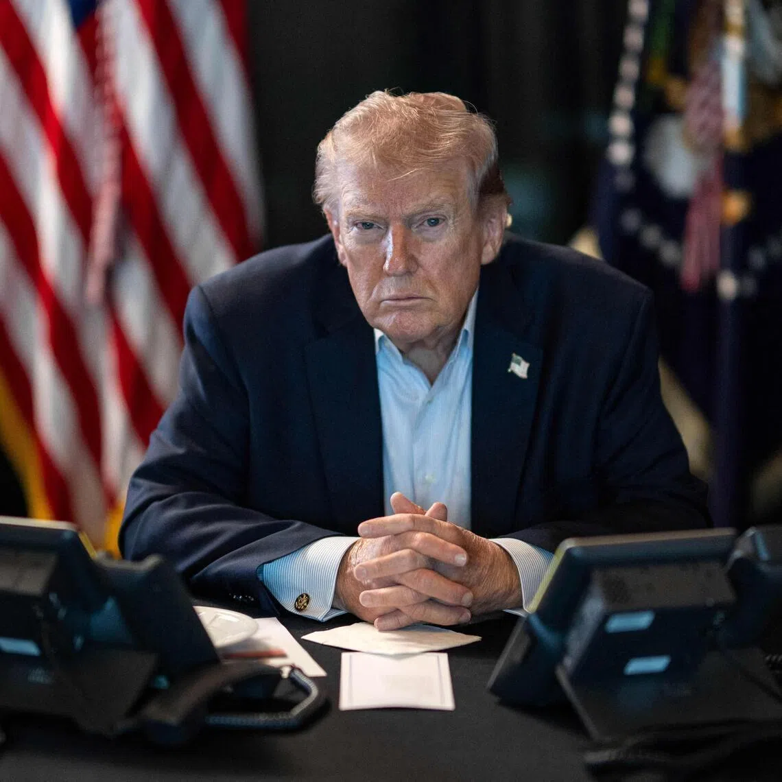 TOPSHOT - This official White House photograph taken on March 1, 2026 and released on March 2, 2026 on the White House X account shows US President Donald Trump overseeing "Operation Epic Fury" activity against Iran from Mar-a-Lago in Palm Beach, Florida. US President Donald Trump warned that his attack on Iran could extend longer than a month, as the war spread on March 3 with Israel bombarding Lebanon and Tehran targeting US allies in the Gulf, including drones hitting the US embassy in Saudi Arabia. (Photo by Daniel TOROK / The White House / AFP) / RESTRICTED TO EDITORIAL USE - MANDATORY CREDIT "AFP PHOTO / THE WHITE HOUSE / DANIEL TOROK" - HANDOUT - NO MARKETING NO ADVERTISING CAMPAIGNS - DISTRIBUTED AS A SERVICE TO CLIENTS
