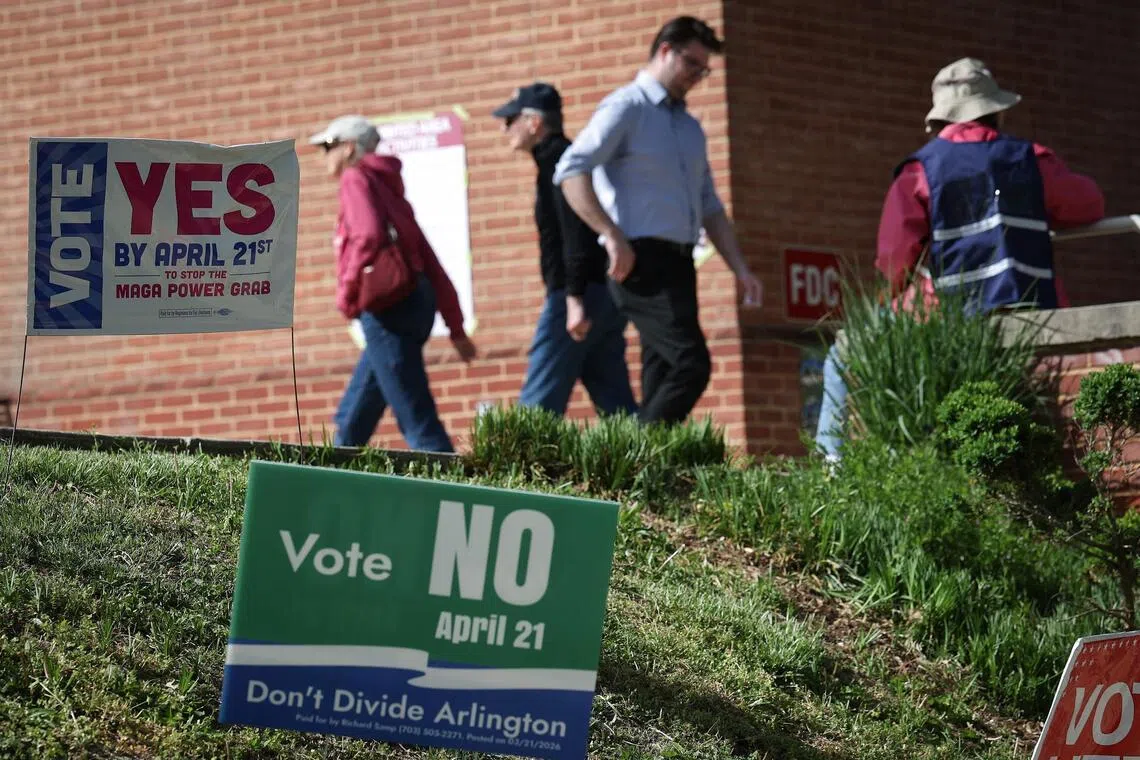 Voters arriving to cast their ballots on allowing the Virginia General Assembly to redraw congressional districts, on April 21, in Arlington, Virginia.