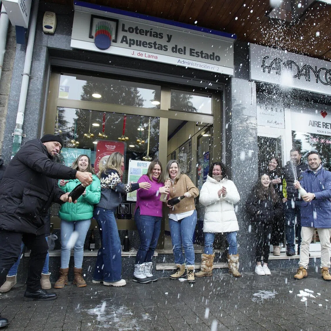 People in Spain's Leon province celebrate winning the first prize in the national “El Gordo” (The Fat One) lottery on Dec 22.