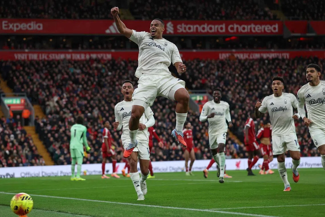 Nottingham Forest defender Murillo (centre) celebrates scoring the team's first goal against Liverpool.